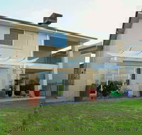 Waterfront Villa in Sanctuary Lakes - Accommodation Sunshine Coast