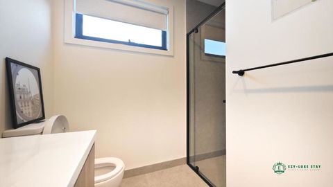 Queen Bed Stylish Suite With TV - Room 12 - Accommodation Sunshine Coast 1